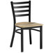 A Lancaster Table & Seating black metal chair with a wooden seat and ladder back.