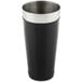 A black stainless steel cup with a stainless steel bottom and handle.