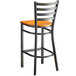 A Lancaster Table & Seating copper metal ladder back bar stool with a wooden seat.