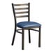 A Lancaster Table & Seating metal ladder back chair with navy cushion.