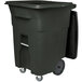 A green Toter rectangular trash can with casters and a lid.