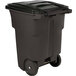 A brownstone Toter rectangular trash can with wheels.