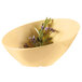 A GET Diamond Harvest squash melamine bowl with lavender flowers in it.