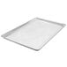 A Vollrath Wear-Ever aluminum sheet pan with a wire mesh in rim.