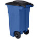 A blue Toter rectangular trash can with black wheels and lid.