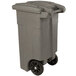 A gray Toter rectangular wheeled commercial trash can.