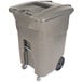 A grey Toter rectangular wheeled commercial trash can with a barrel lock lid.
