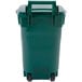 A green rectangular Toter trash can with a white lid.