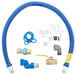 A blue Dormont gas connector kit with various parts and a restraining cable.
