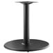 A black metal Lancaster Table & Seating round outdoor table base.