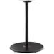 A black metal table base with a round base and metal pole.