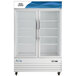 An Avantco white glass door merchandiser freezer.