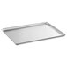 A Vollrath Wear-Ever heavy-duty aluminum bun / sheet pan on a counter in a professional kitchen.