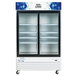 A white Avantco glass door refrigerator with shelves inside.