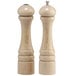 Two wooden Chef Specialties pepper mills with a natural wood finish.