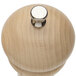 A Chef Specialties wooden pepper mill with a silver knob.