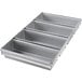 A silver Chicago Metallic bread loaf pan with 4 compartments.