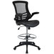 A Flash Furniture black mesh office chair with a black leather seat and metal base.