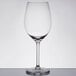 A clear Libbey wine glass on a white background.