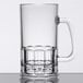 A clear plastic GET beer mug with a handle.