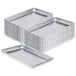 A stack of rectangular silver Choice quarter size aluminum trays with a wire in rim.