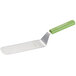 A Dexter-Russell Sani-Safe solid turner with a green handle.