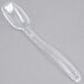 A clear plastic spoon with a long handle.