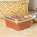 A Carlisle plastic food pan with pasta and red sauce in it.