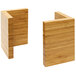 Two natural bamboo L-shape risers on a table.