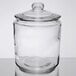A Choice clear glass jar with a lid.