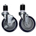 A pair of Advance Tabco heavy duty casters with rubber wheels.