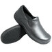A pair of Genuine Grip black leather slip-on shoes.