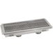 An Advance Tabco stainless steel floor trough drain grate.