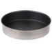 A Vollrath Wear-Ever round metal cake pan with a black rim.