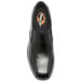 A close-up of a Genuine Grip black slip-on dress shoe with an orange sole.