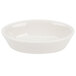 A white oval baker dish on a white background.