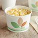 A Bare by Solo paper cup filled with macaroni and cheese.