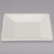 A white square plate with a small rim.