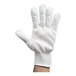 A white Victorinox cut resistant glove on a hand.