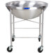 A large stainless steel Vollrath mixing bowl on a metal stand with wheels.