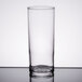 A clear Libbey straight sided glass on a table.
