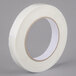 A roll of white Shurtape fiberglass reinforced strapping tape.