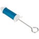 A blue and white Ateco cake decorating syringe with a metal hook.