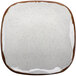 A white square GET Rustic Mill melamine plate with brown specks.