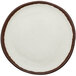 A white plate with brown rim.