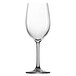 A close-up of a clear Stolzle all-purpose wine glass with a long stem.