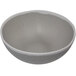 A grey melamine bowl with white speckled rim.