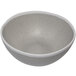 A grey melamine bowl with a speckled white rim.