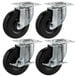 A group of black rubber caster wheels with silver attachments.