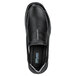 A close-up of a black SR Max Charleston slip-on shoe with a black sole.